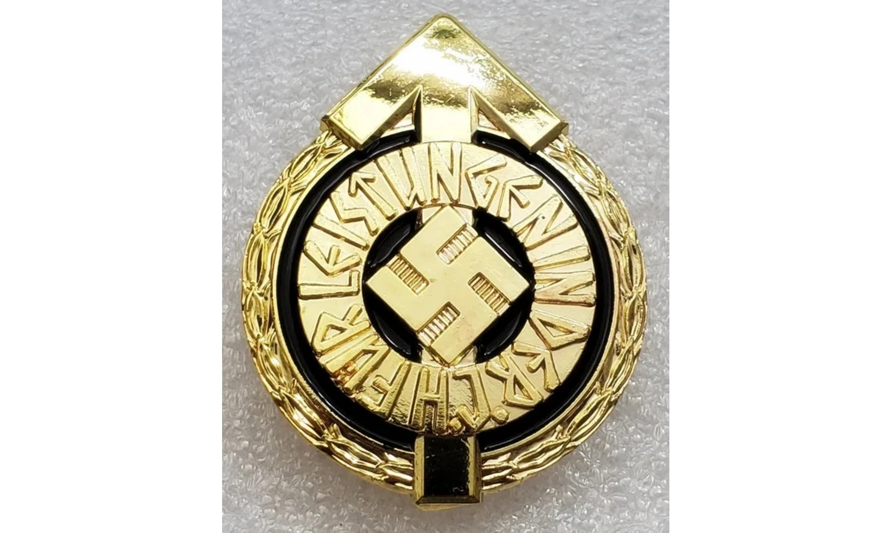 Insignia deportiva de líder HJ en oro