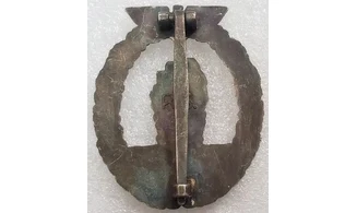 KM Minesweeper badge (OS)