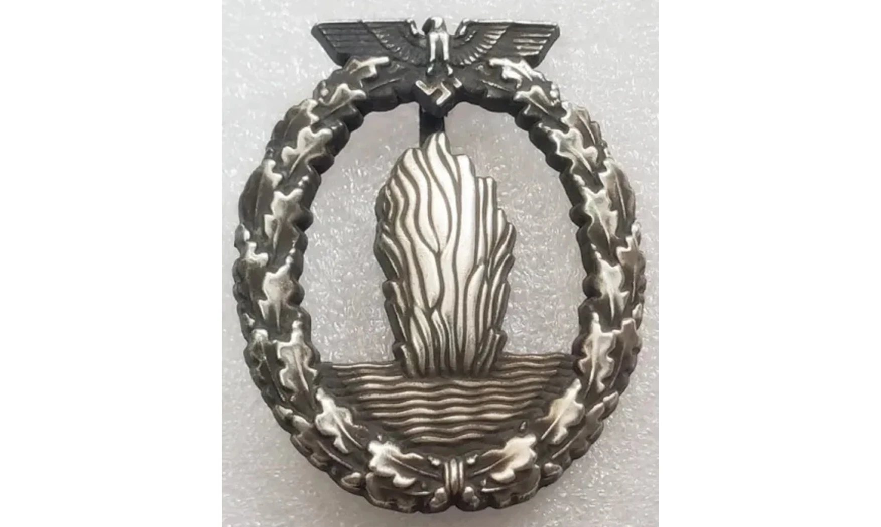 KM Minesweeper badge (OS)